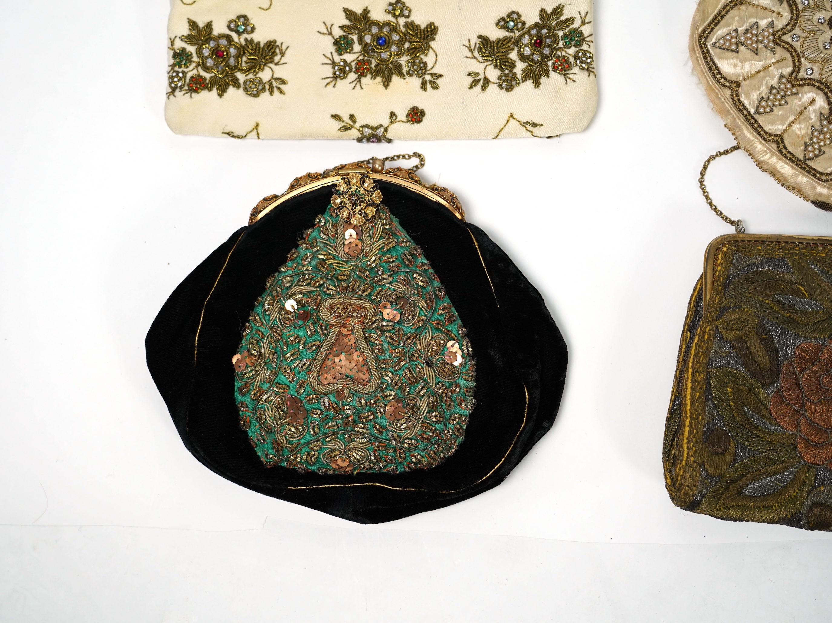 Mixed evening bags; including a 19th century velvet and cut steel handbag, a similar bag, three later gold metallic embroidered evening bags, a mixed metalic evening bag and a diamonte bag and purse (8)